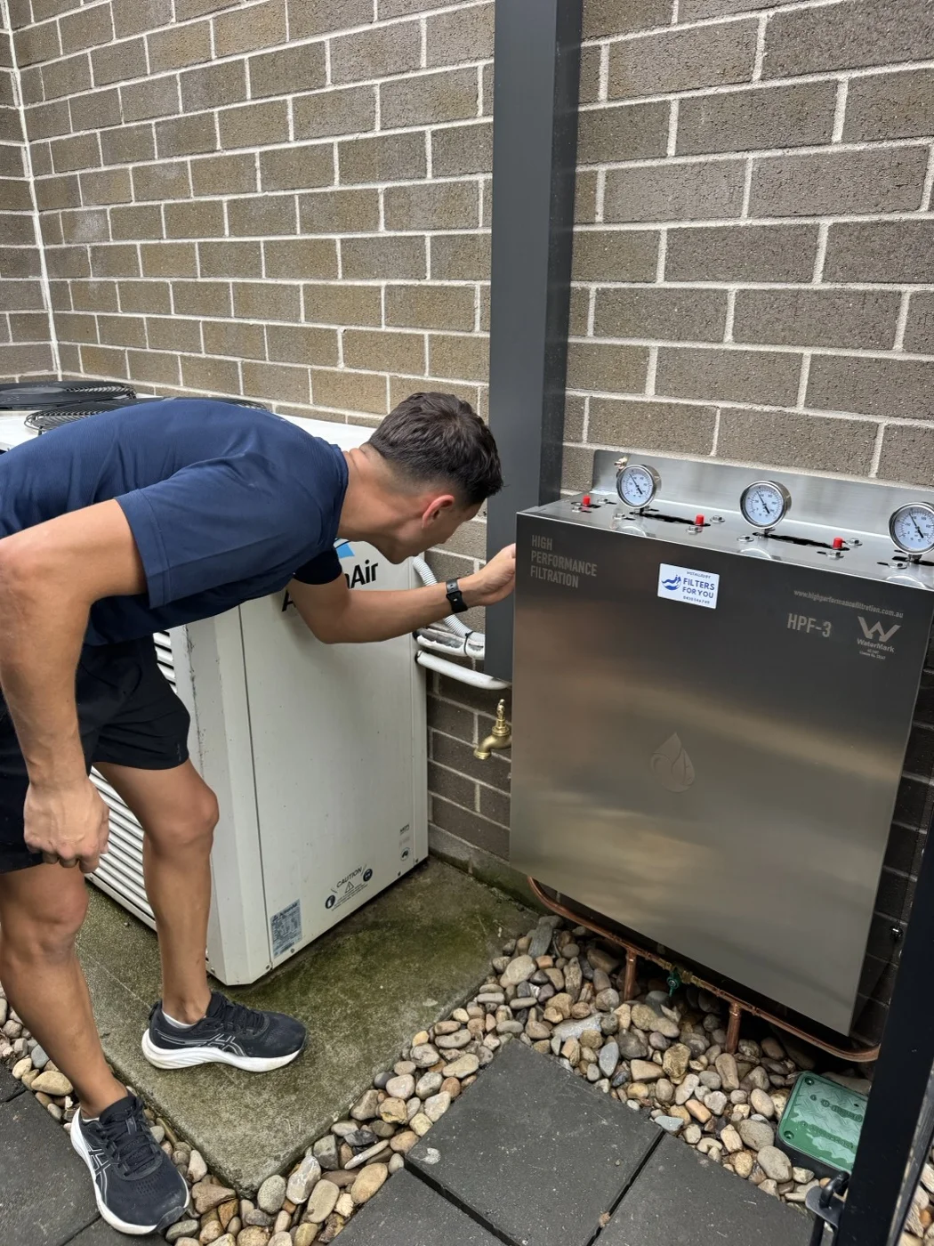 Reverse osmosis water filter system installed under sink Sydney home
